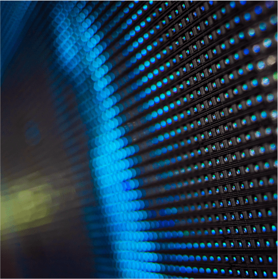 Abstract light panel seen at an angle with mostly blue lights